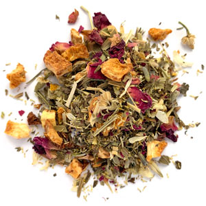 A variety of dried herbs and fruits, mixed together, likely components of a loose leaf tea blend.
