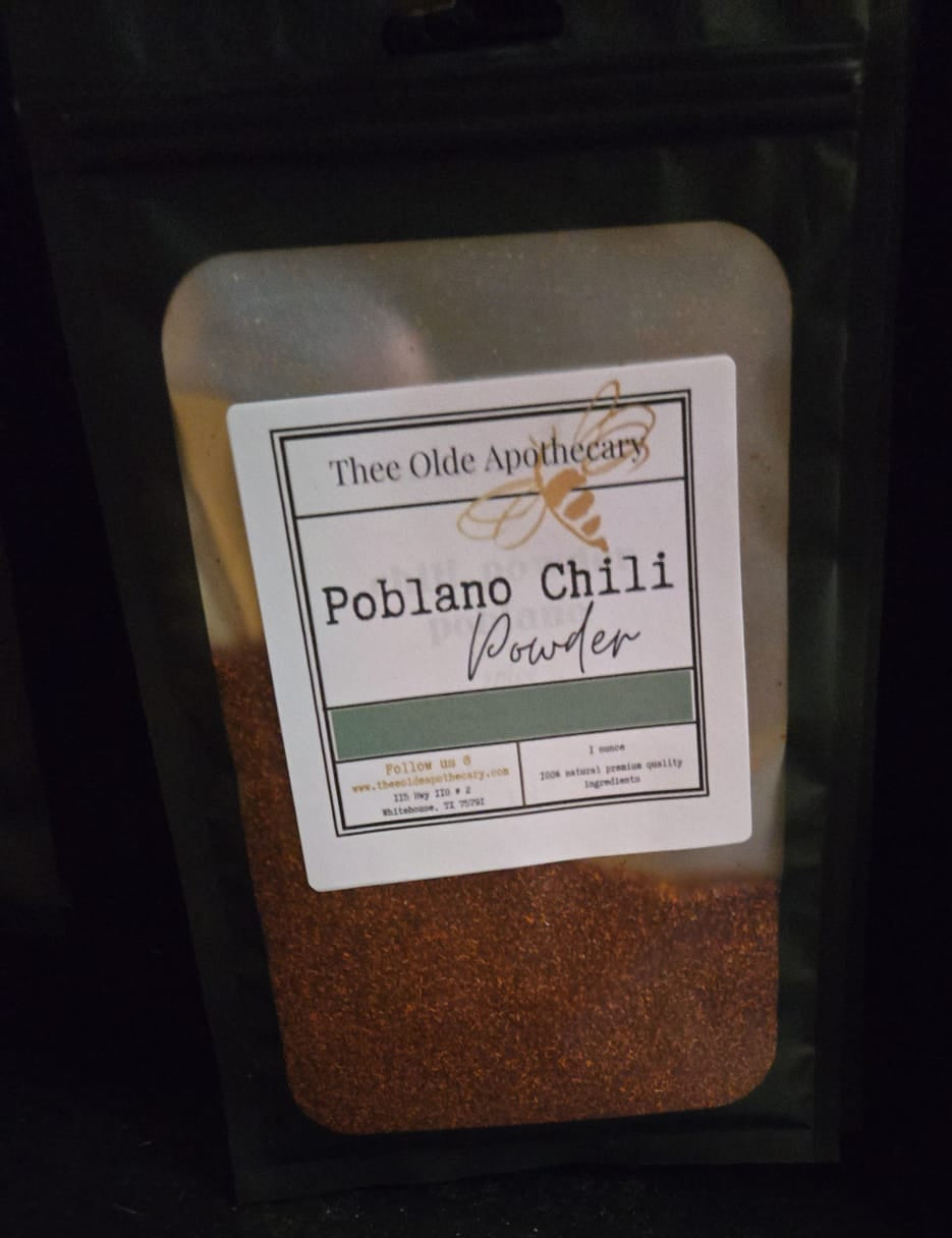 Package of Poblano Chili Powder with a label on a dark background